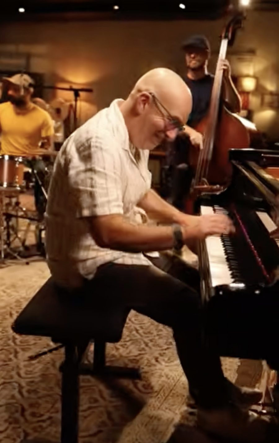 Peter Martin at the piano with Kaleb Kirby on drums and Bob DeBoo on bass